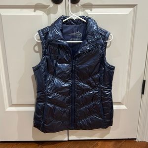 Reel Life blue vest, size small.